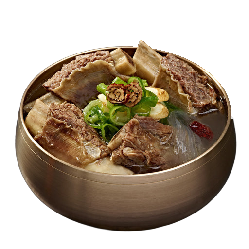 Korean galbitang (beef short rib soup) served in a metal bowl with scallions and clear broth.
